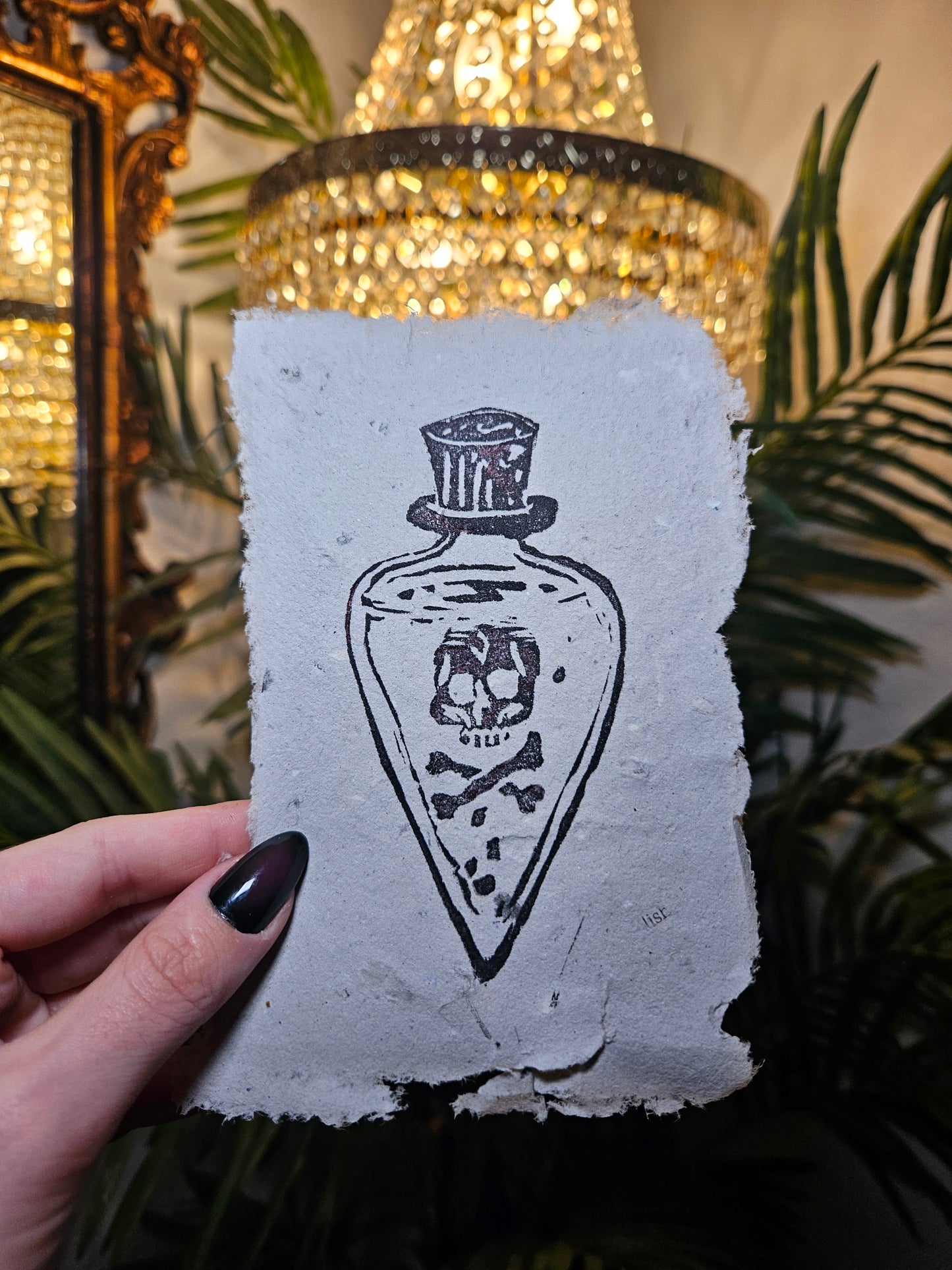 Unframed poison bottle linocut