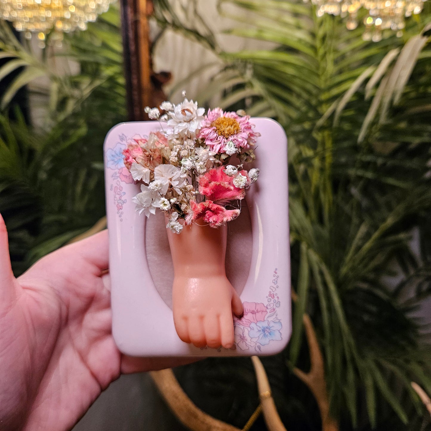 Doll arm bouquet